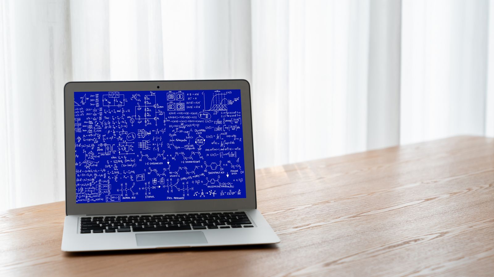 Blue screen error on older laptop with CPU-Z showing processor details in background